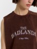 Топ женский коричневый с обработкой эйсид и надписью "The badlands" 112992R